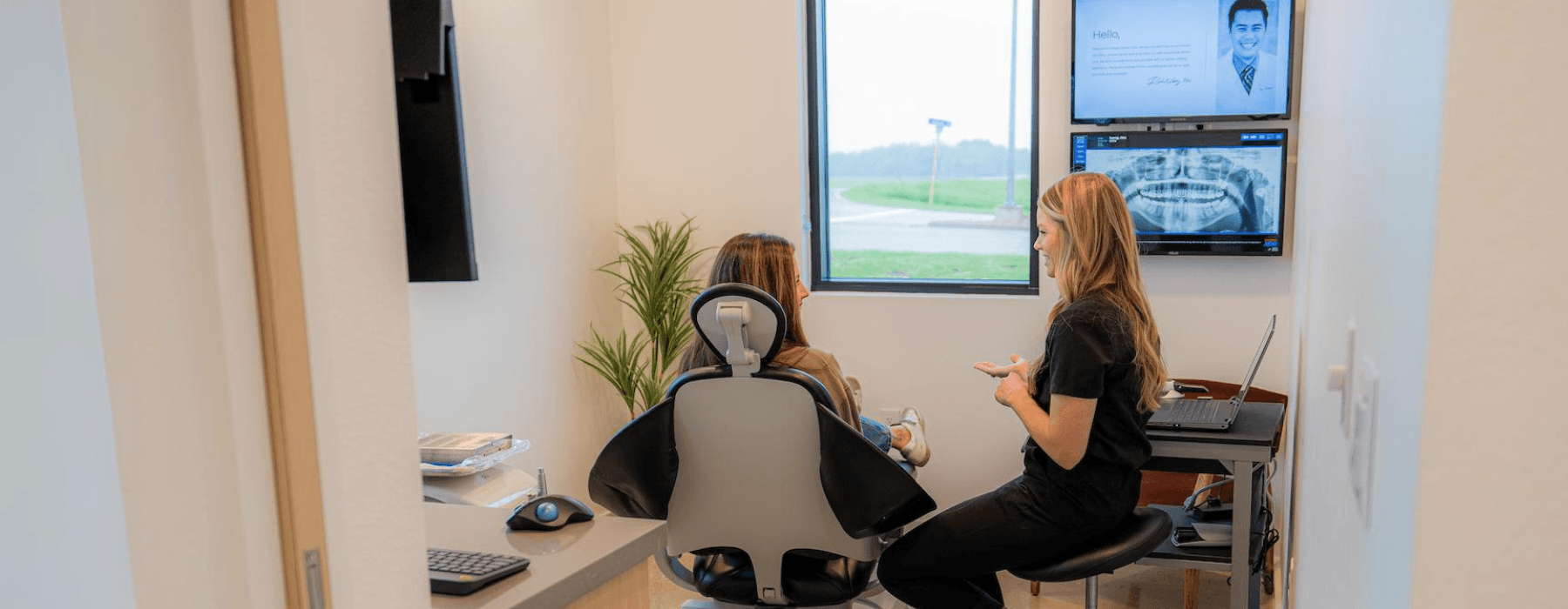 Young couple hugging & smiling l Dentist Temple TX