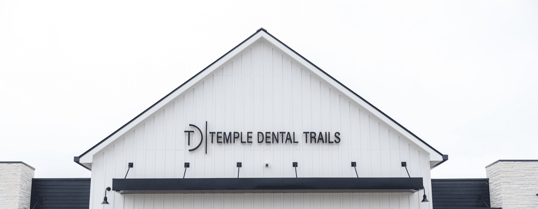 Man with facial hair smiling l Dr. Richard Leung Temple TX